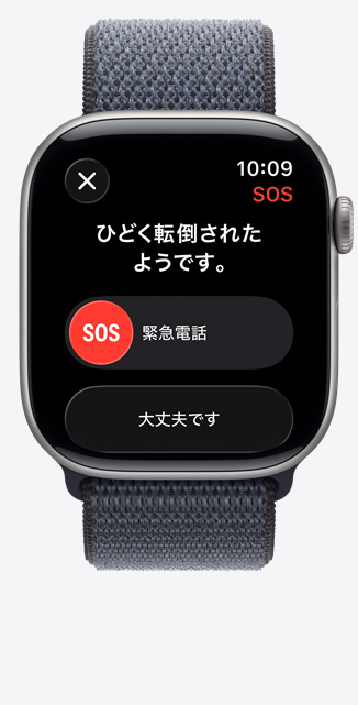 スペースグレイアルミニウムケースのApple Watch Series 11。転倒の通知と緊急電話のオプションが表示されていて、アンカーブルーのスポーツループが取りつけられている
