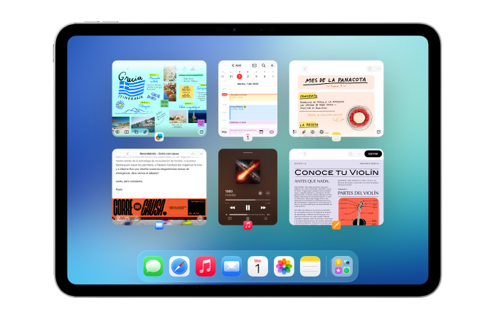Un iPad, posición horizontal, la pantalla muestra varias apps como Calendario y Música acomodadas en un mosaico de seis ventanas dispuestas en dos filas de igual tama?o
