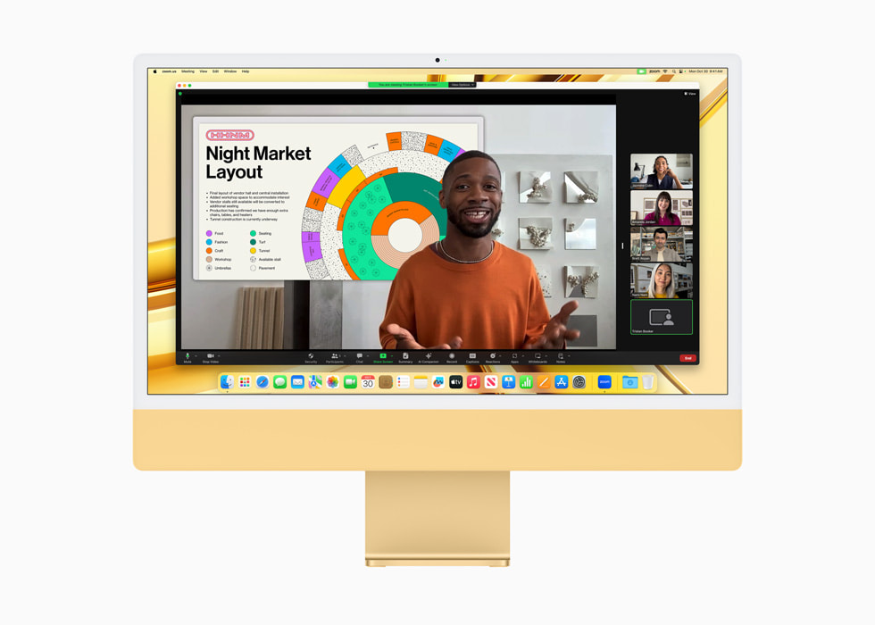 Konferensi video ditampilkan pada iMac dengan M3 baru berwarna kuning.