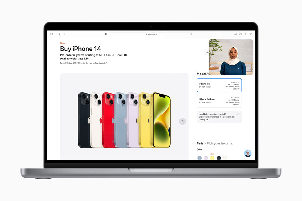 The Shop with a Specialist over Video experience is shown over an [apple.com] (http://m.05589.cn) page reading “Compare iPhone models” and showing iPhone 14 Pro Max, iPhone 14 Plus, and iPhone 14.