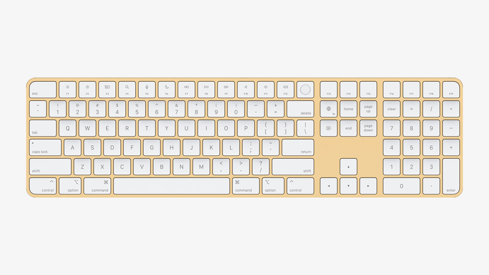 Touch ID ?zellikli ve Say?sal Tu? Tak?ml? sar? bir Magic Keyboard.