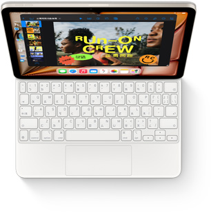 iPad Air 搭配白色巧控鍵盤的俯視圖。