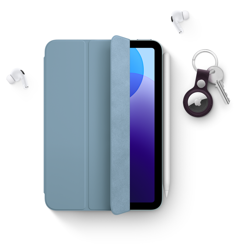 iPad mini with Smart Folio, Apple Pencil Pro, AirPods Pro and AirTag with key ring.