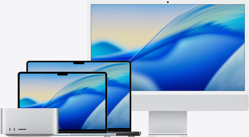 Mac modelleri ailesinden soldan sa?a macOS Tahoe duvar ka??d?: Mac Studio, G?k Mavisi 13 in? MacBook Air, Uzay Siyah? 14 in? MacBook Pro ve Gümü? Rengi 24 in? iMac