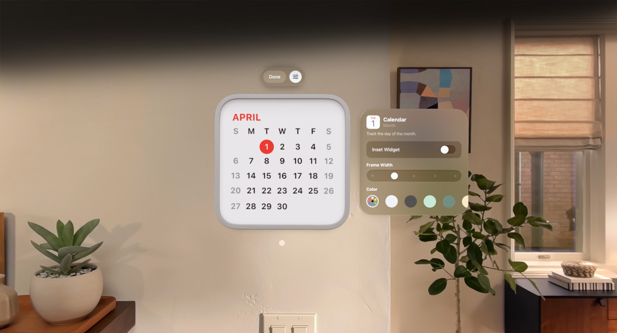 Calendar widget reading: April 1st floats on wall, reminder widget above, personalization options to change frame thickness and color to right